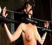 Ball-gagged brunette feels the brunt of BDSM