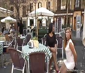Brunette smoking in public cafe outdoor